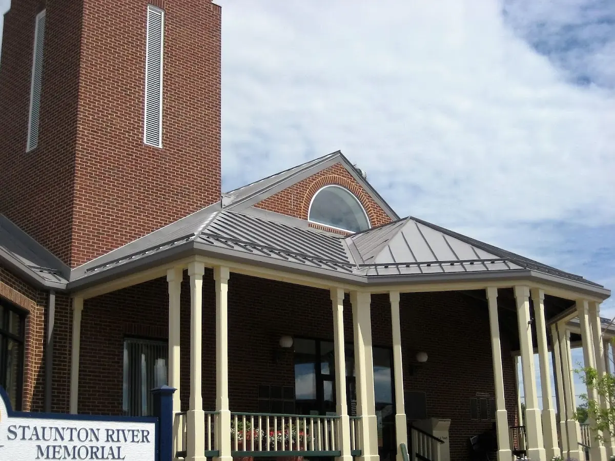 Skilled roofing craftsmen working on a residential roof in Worley